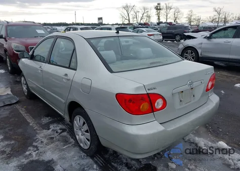 2003 Toyota Corolla Le z USA, uszkodzony, nr VIN JTDBR32EX32012593